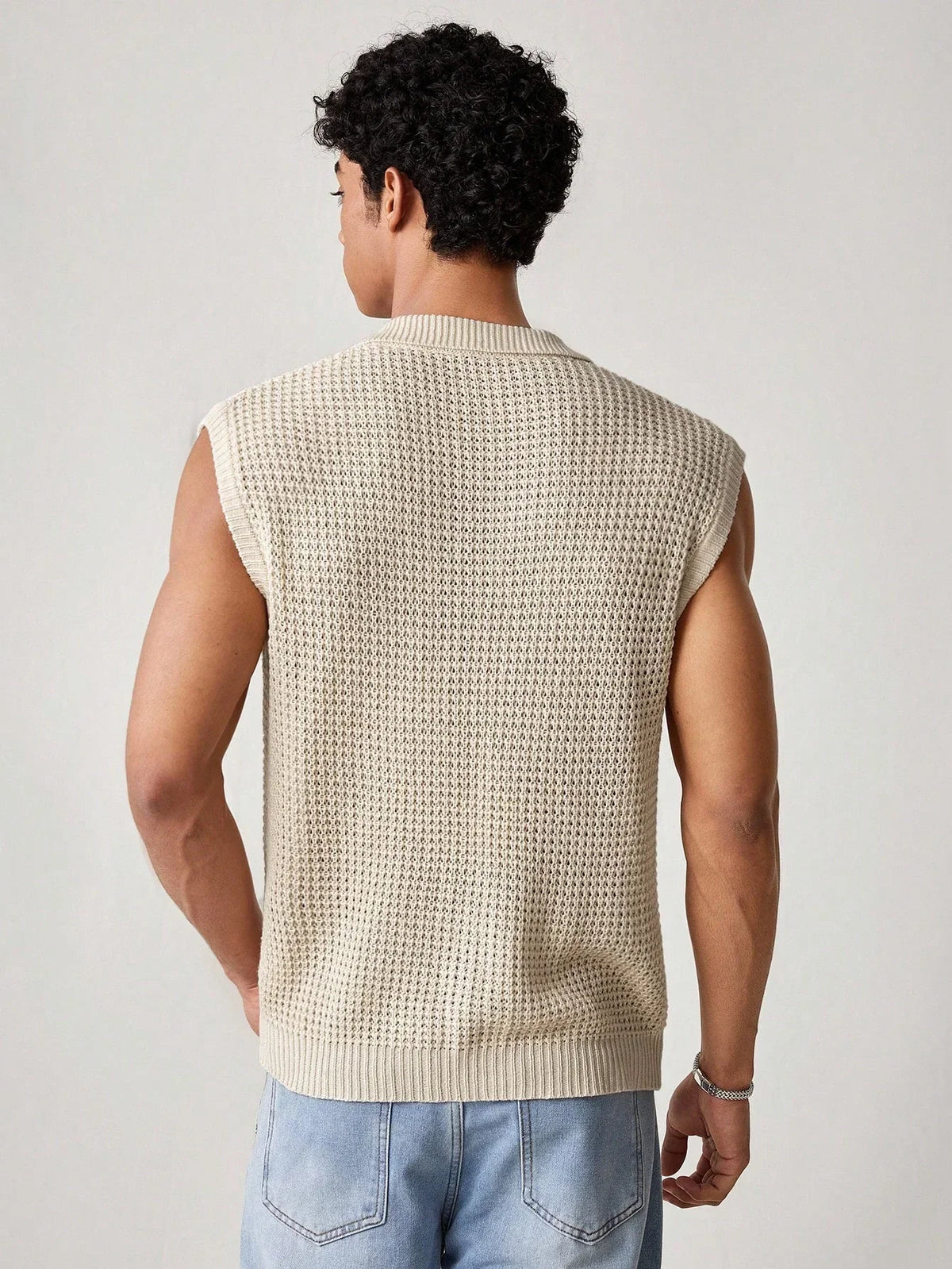 Ärmelloses Herren-Poloshirt aus Strick mit Pointelle-Durchbruchmuster, Schwarz